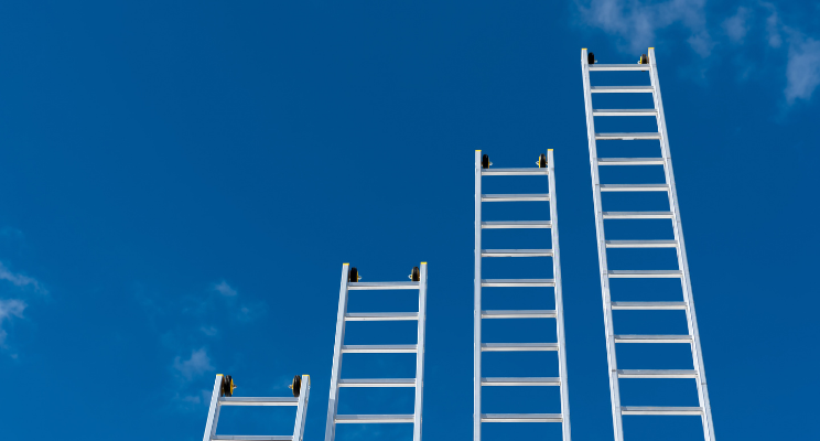 bottom view of several ladders at different heights