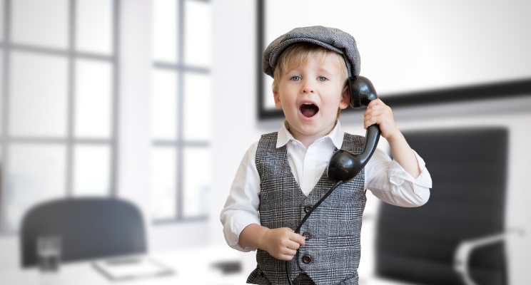 child holding a phone